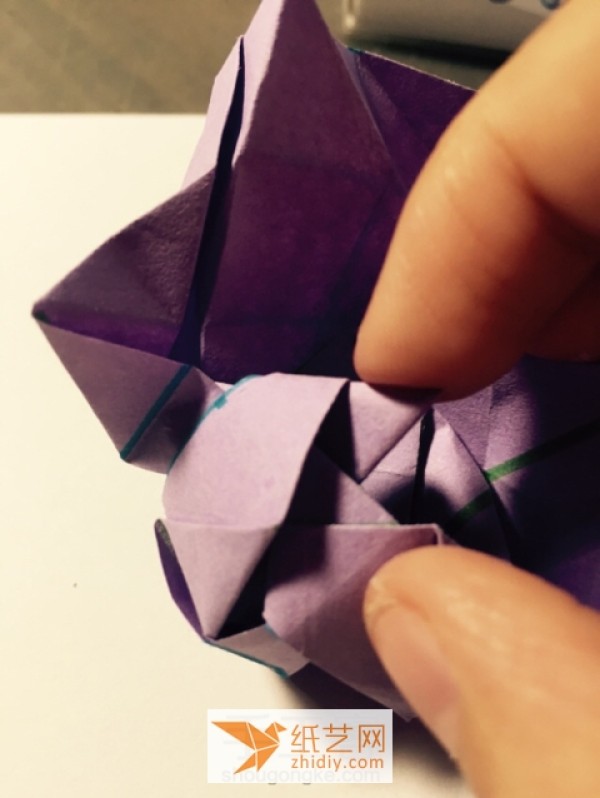 Detailed step-by-step tutorial on making Kawasaki rose origami