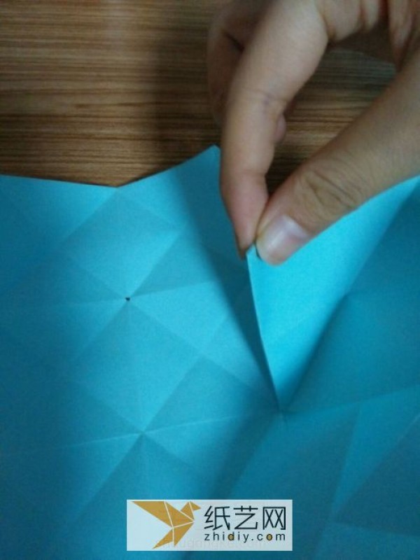 An educational three-dimensional square origami