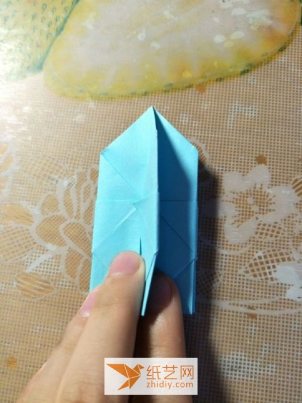 Tutorial on how to make a simple origami pagoda for children