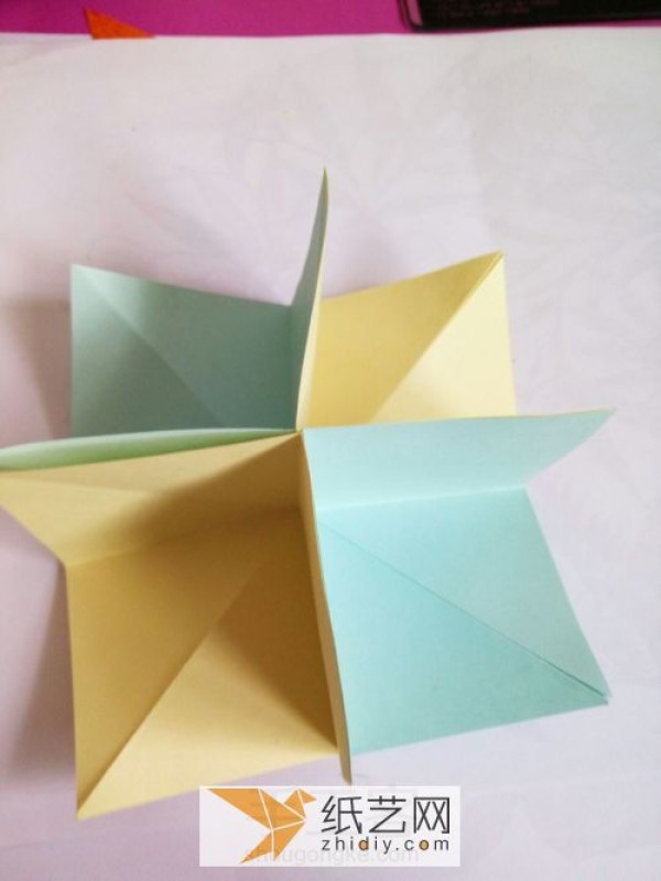 How to make a handmade three-dimensional Valentines Day greeting card using an origami exploding box mechanism