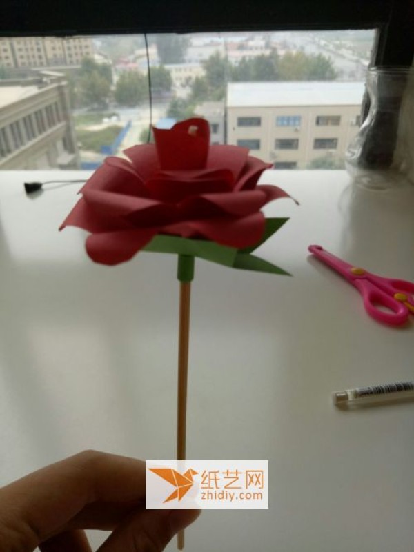 Let me teach you how to make a super simple paper rose.