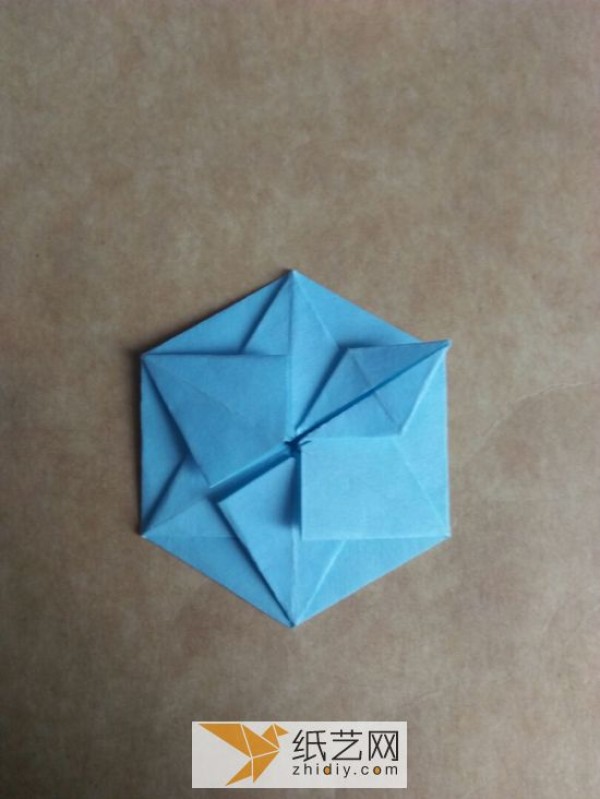 You can also fold a piece of paper into three-dimensional snowflakes!