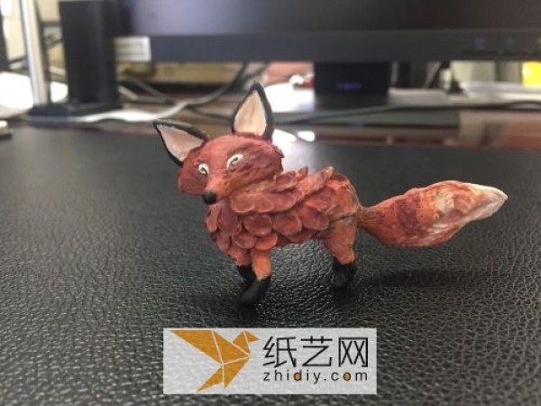 Cute little fox made of ultra-light clay