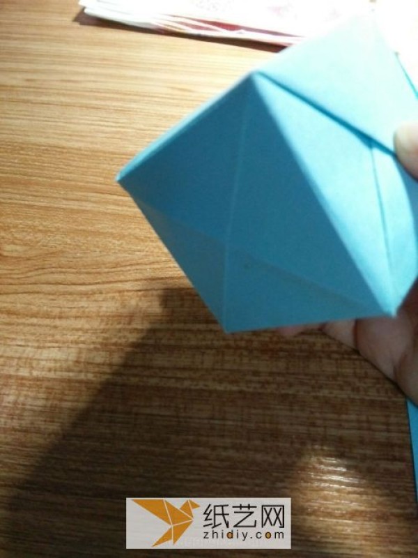 An educational three-dimensional square origami