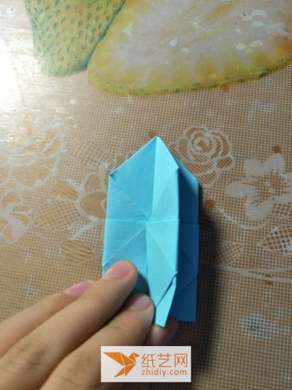 Tutorial on how to make a simple origami pagoda for children