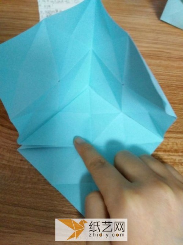 An educational three-dimensional square origami