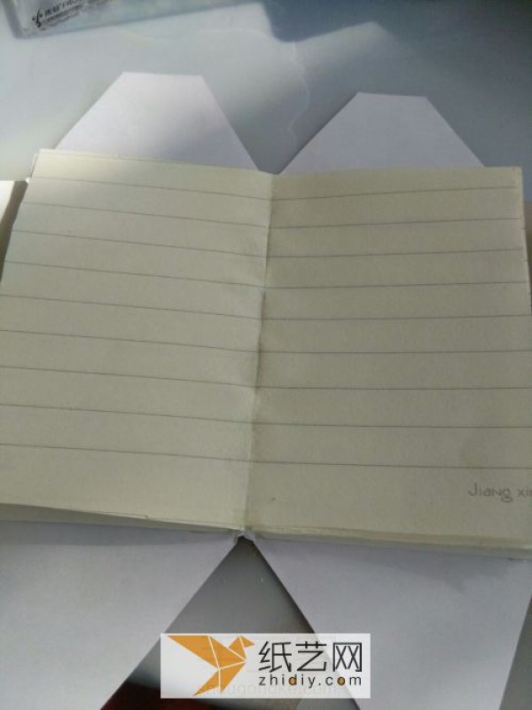 Turn waste into treasure by using old paper to make cute little books and diaries