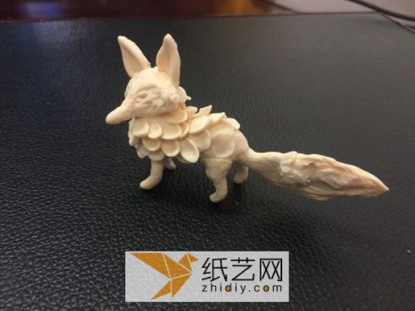 Cute little fox made of ultra-light clay