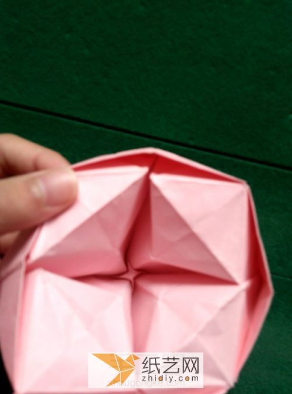 The wine glass origami rose transforms into a beautiful origami basket in just a few steps