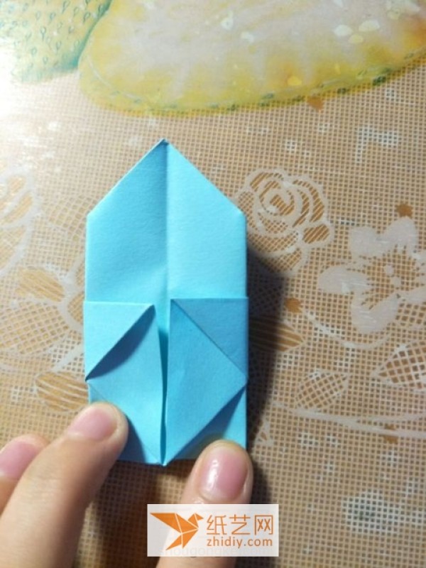 Tutorial on how to make a simple origami pagoda for children