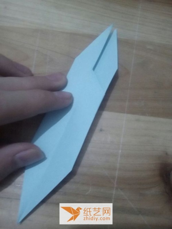 Innovative tutorial on how to make a flying origami crane