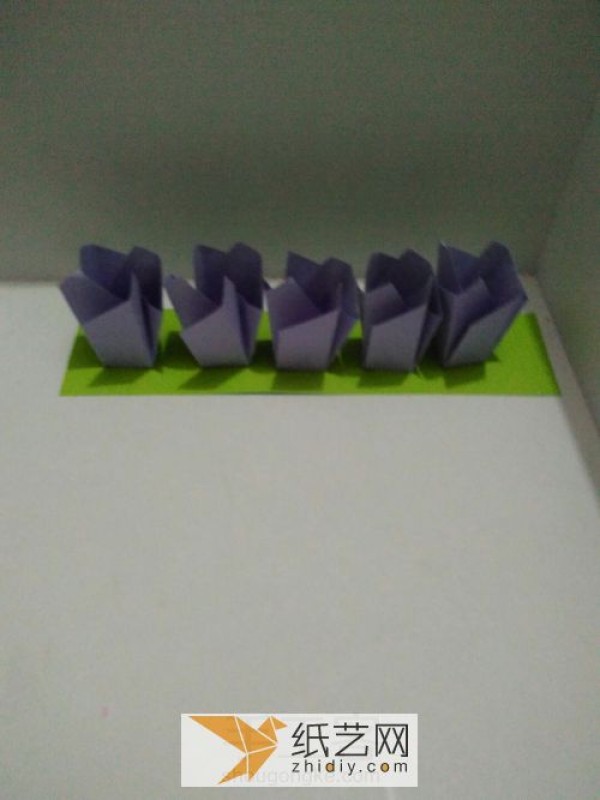 How to make origami flowers by hand. Tutorial on origami tulips.