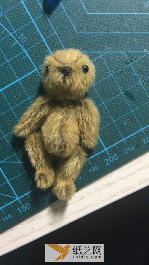 A birthday gift for the furry bear made from wool felt poking fun