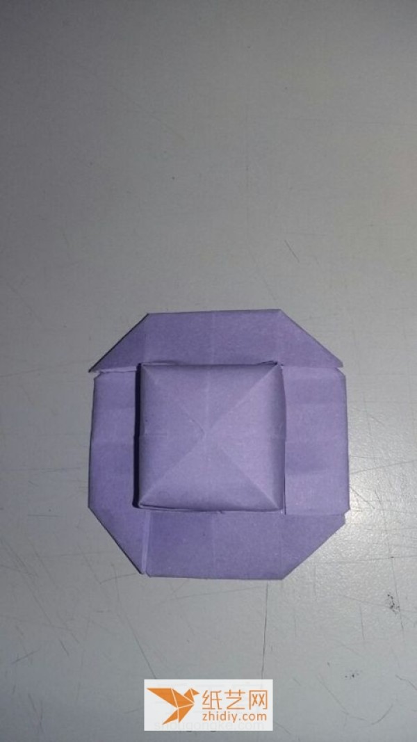 A tutorial on how to make a simple origami hat. I wouldn’t object if it’s an origami box.