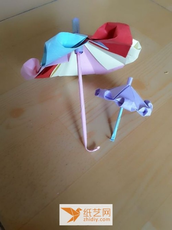 Illustrated tutorial on how to make a beautiful origami sun umbrella