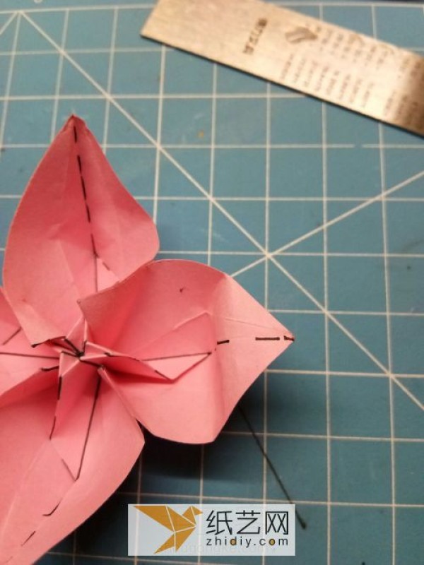 Simple origami flowers are the icing on the cake for Teacher’s Day gifts