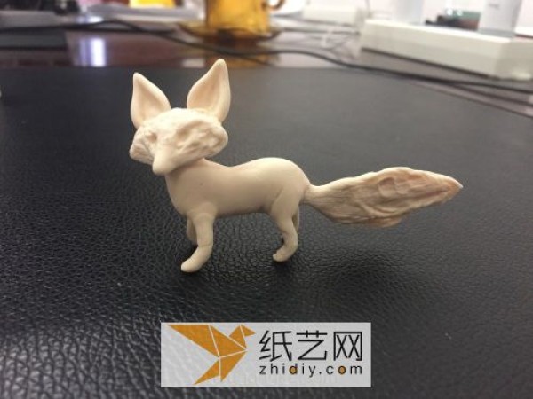 Cute little fox made of ultra-light clay