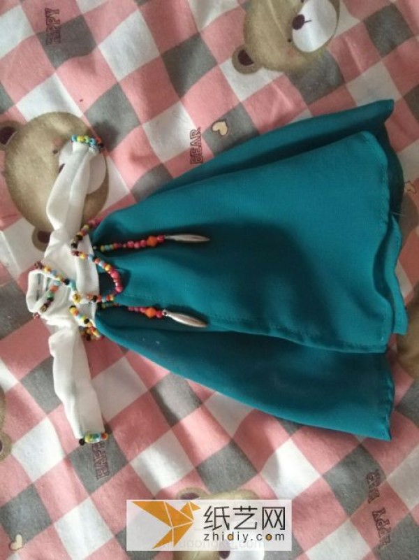 In the New Year, the doll will be given a Korean dress made of handmade fabrics.