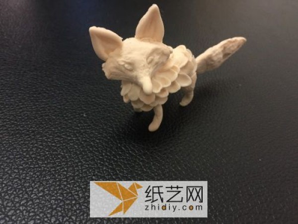 Cute little fox made of ultra-light clay