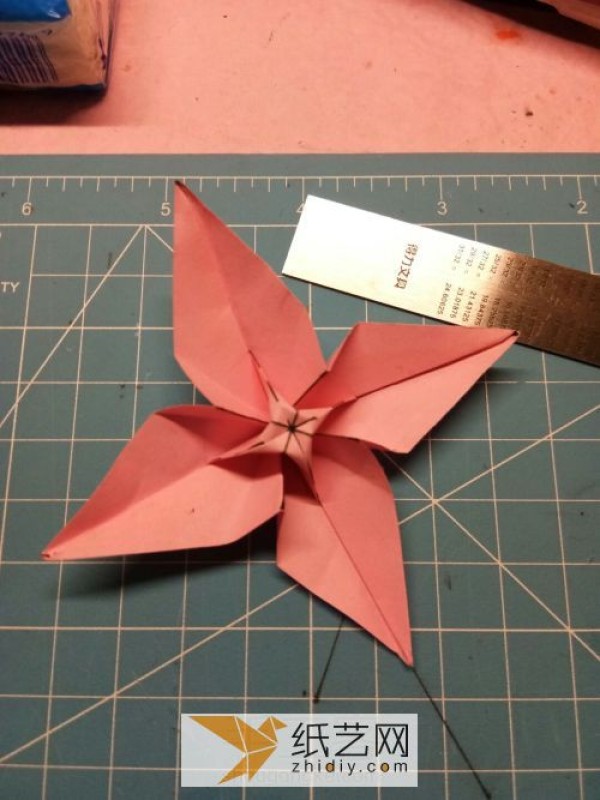 Simple origami flowers are the icing on the cake for Teacher’s Day gifts