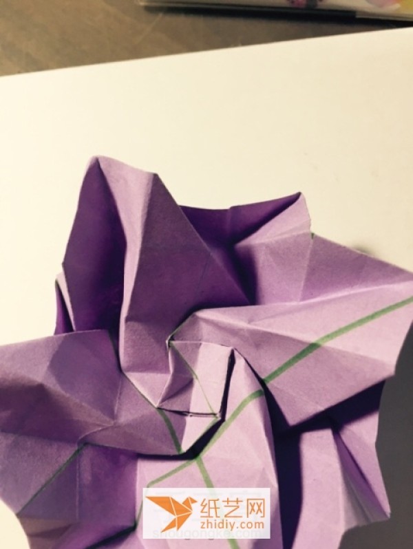 Detailed step-by-step tutorial on making Kawasaki rose origami