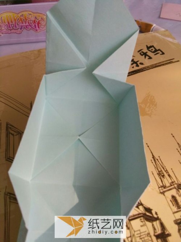 A simple and practical origami box tutorial. How to fold a storage box.