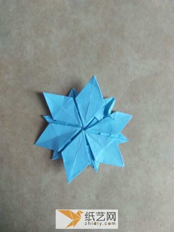 You can also fold a piece of paper into three-dimensional snowflakes!