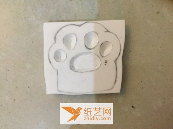 Beginners tutorial on making puppy paws with colored rubber stamps