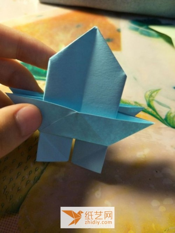 Tutorial on how to make a simple origami pagoda for children