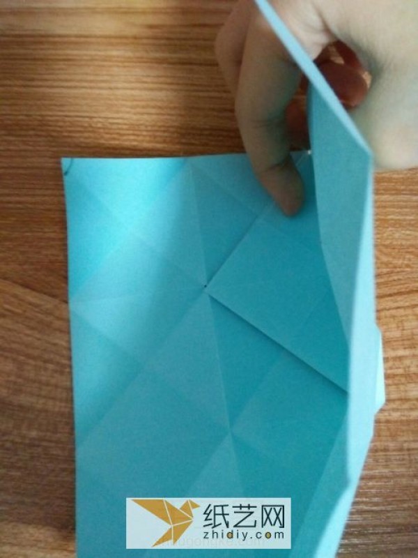 An educational three-dimensional square origami