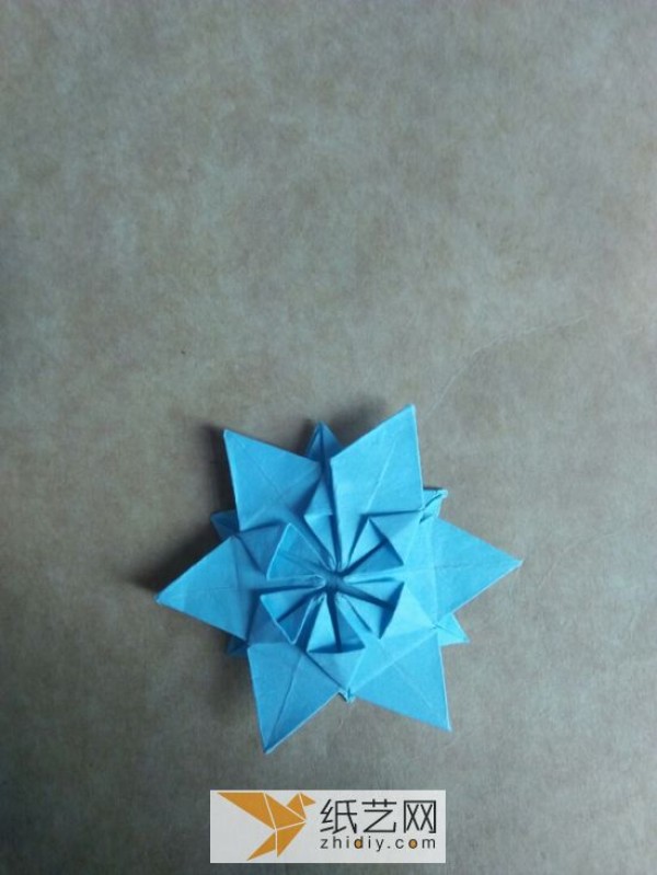 You can also fold a piece of paper into three-dimensional snowflakes!