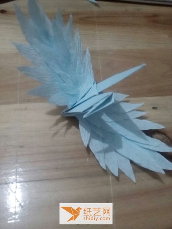 Innovative tutorial on how to make a flying origami crane