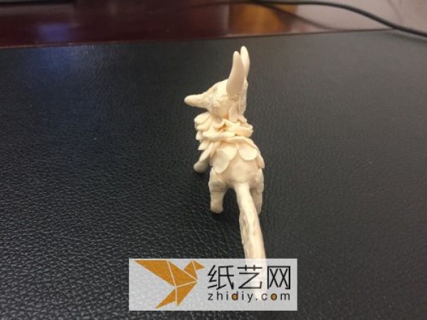 Cute little fox made of ultra-light clay