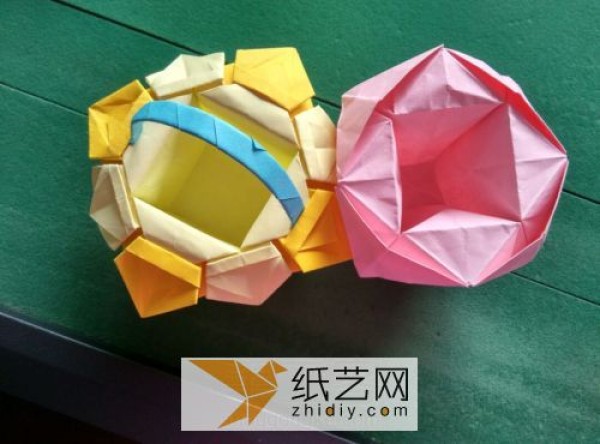 The wine glass origami rose transforms into a beautiful origami basket in just a few steps