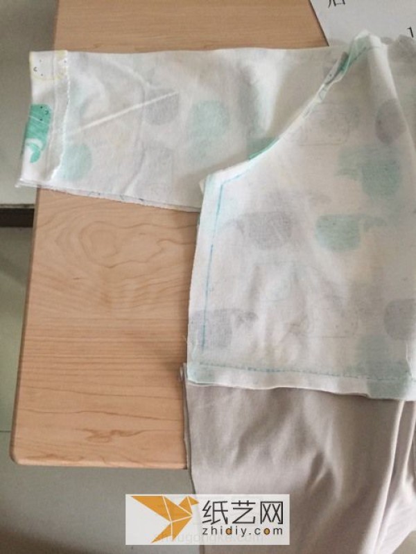 Handmade fabric baby onesie