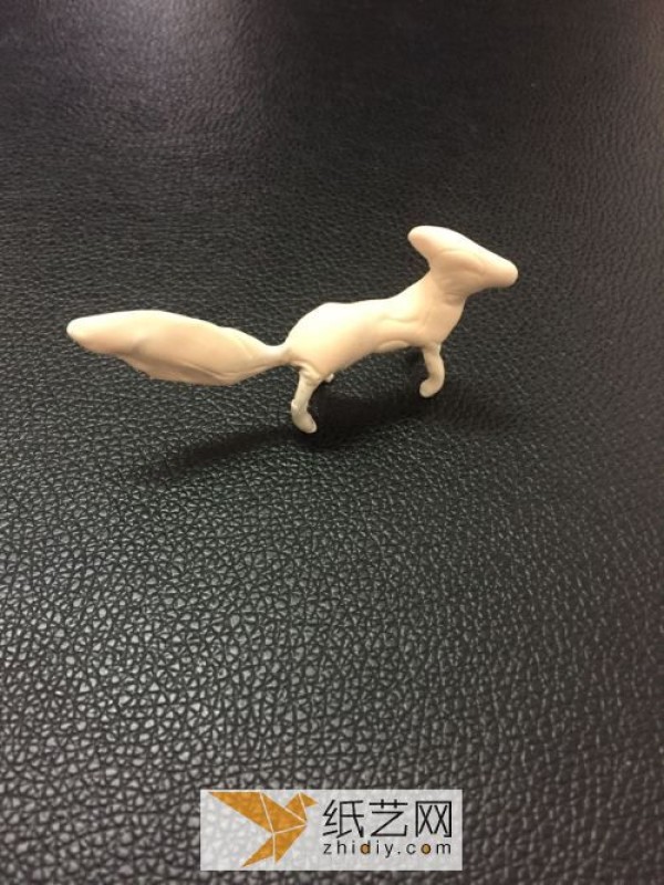 Cute little fox made of ultra-light clay