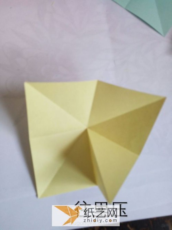 How to make a handmade three-dimensional Valentines Day greeting card using an origami exploding box mechanism