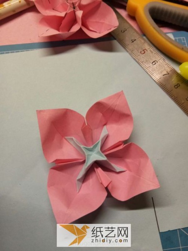 Simple origami flowers are the icing on the cake for Teacher’s Day gifts