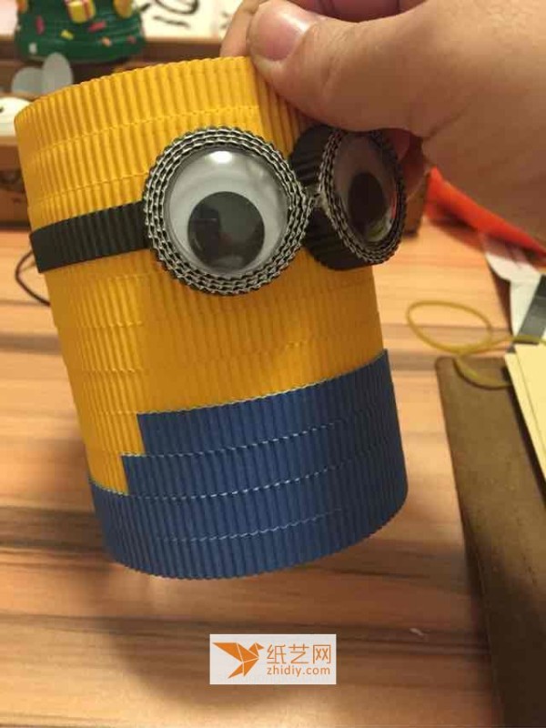 Use corrugated paper to make handmade paper minion (also a tutorial on turning waste into treasure)