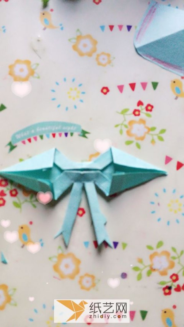 Illustrated origami tutorial for origami butterflies and origami bows