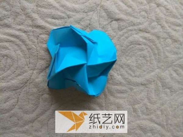 Improved Kawasaki Rose Folding Illustrated Tutorial. Actual photos teach you how to fold paper roses.