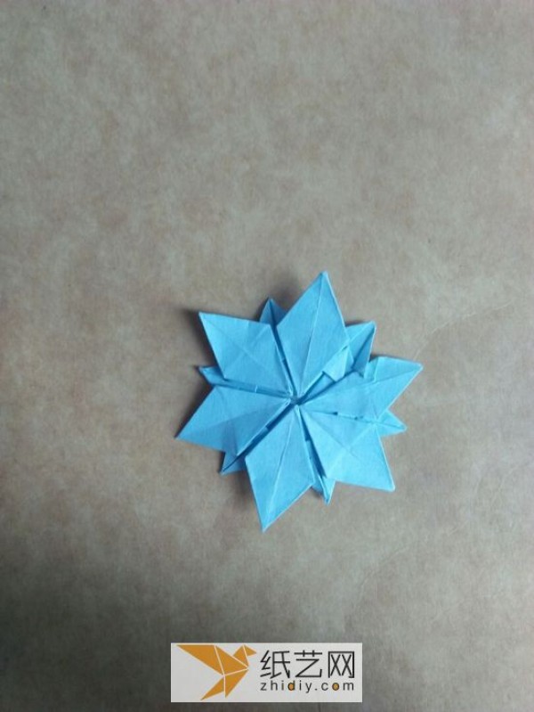 You can also fold a piece of paper into three-dimensional snowflakes!