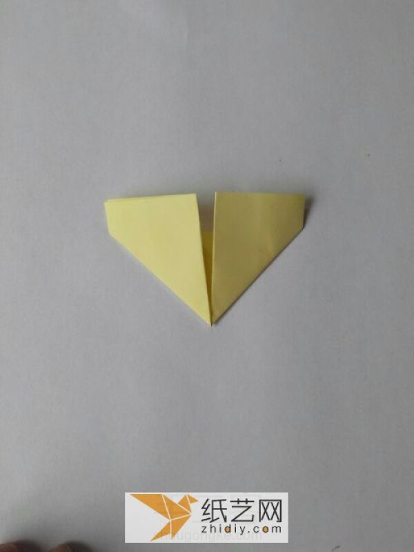 Super cute origami triangle with minion