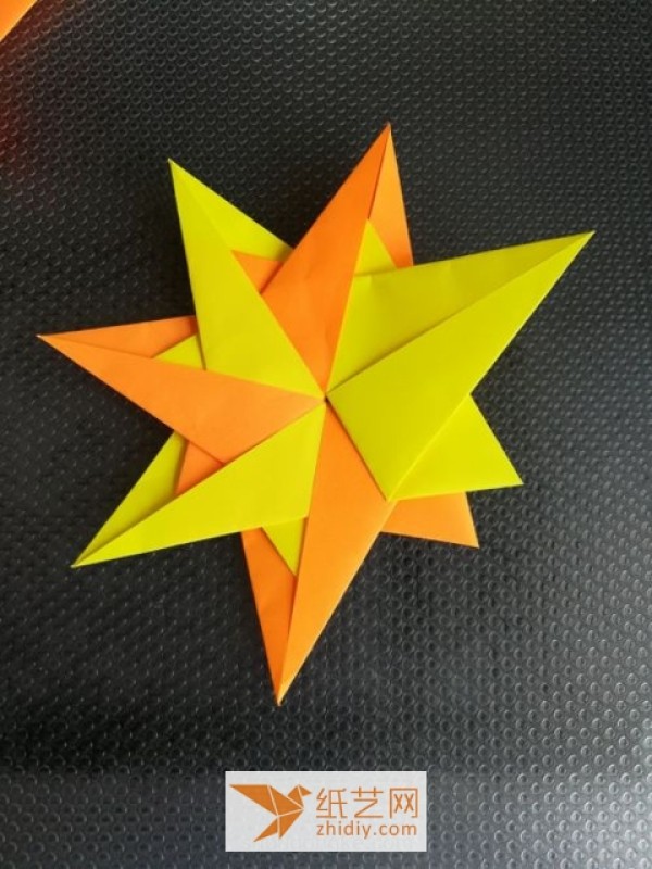 Tutorial to teach you how to make this origami eight-pointed star