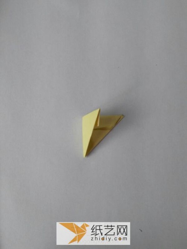 Super cute origami triangle with minion