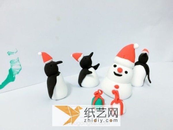 Illustrated handmade tutorial for making Christmas clay penguins and clay gifts