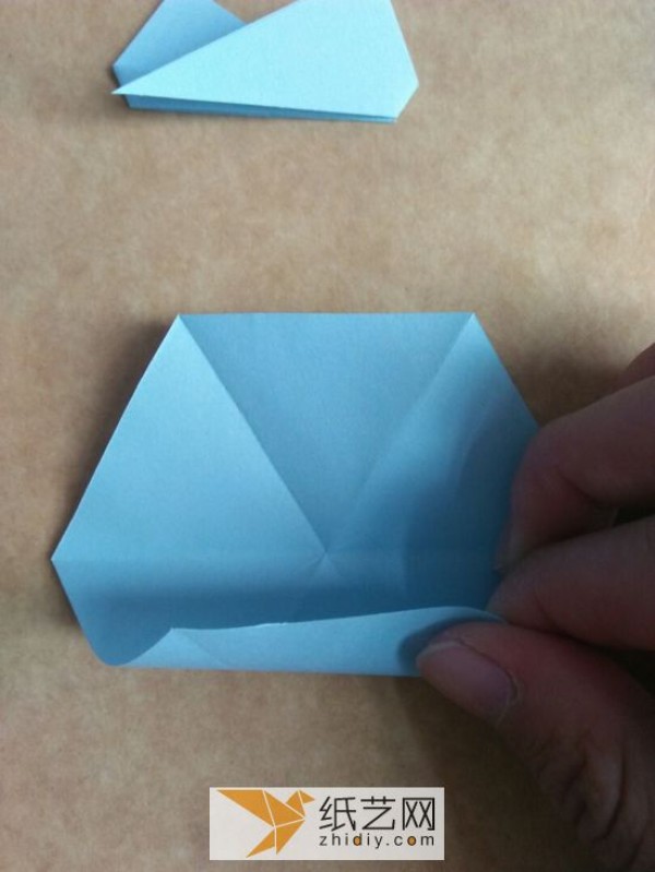 You can also fold a piece of paper into three-dimensional snowflakes!