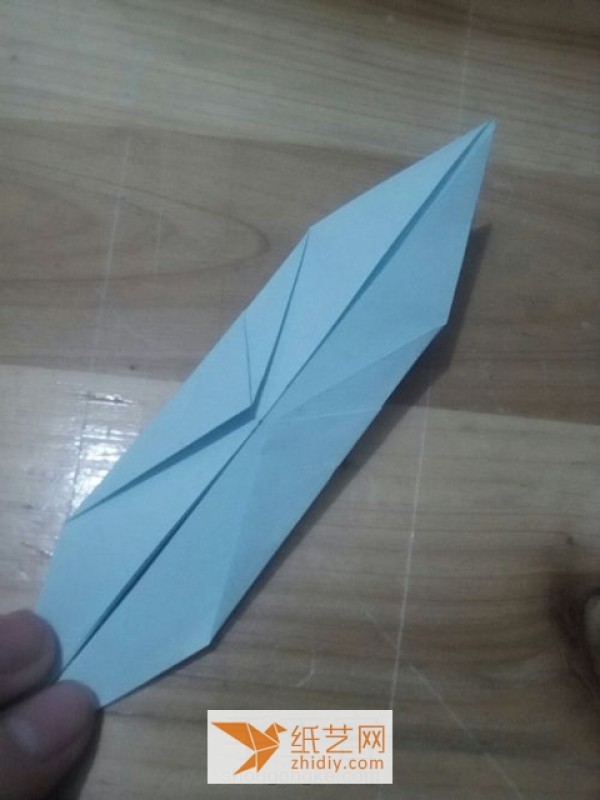 Innovative tutorial on how to make a flying origami crane