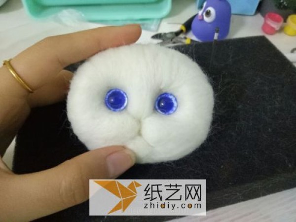 Illustrated tutorial on how to make cute and cute wool felt poking fun kittens