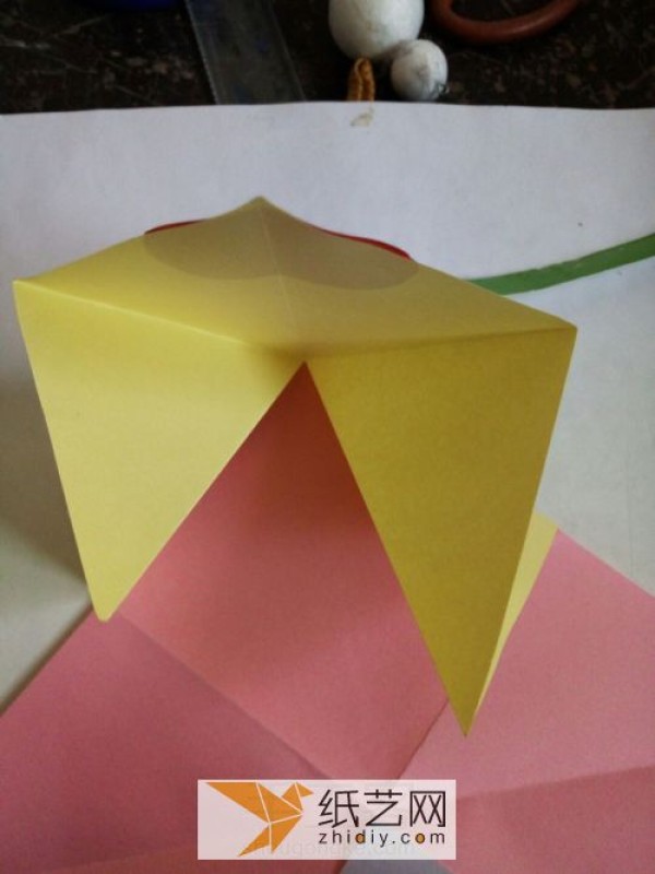 A complete tutorial on exploding box mechanisms to teach you how to make a mysterious origami book